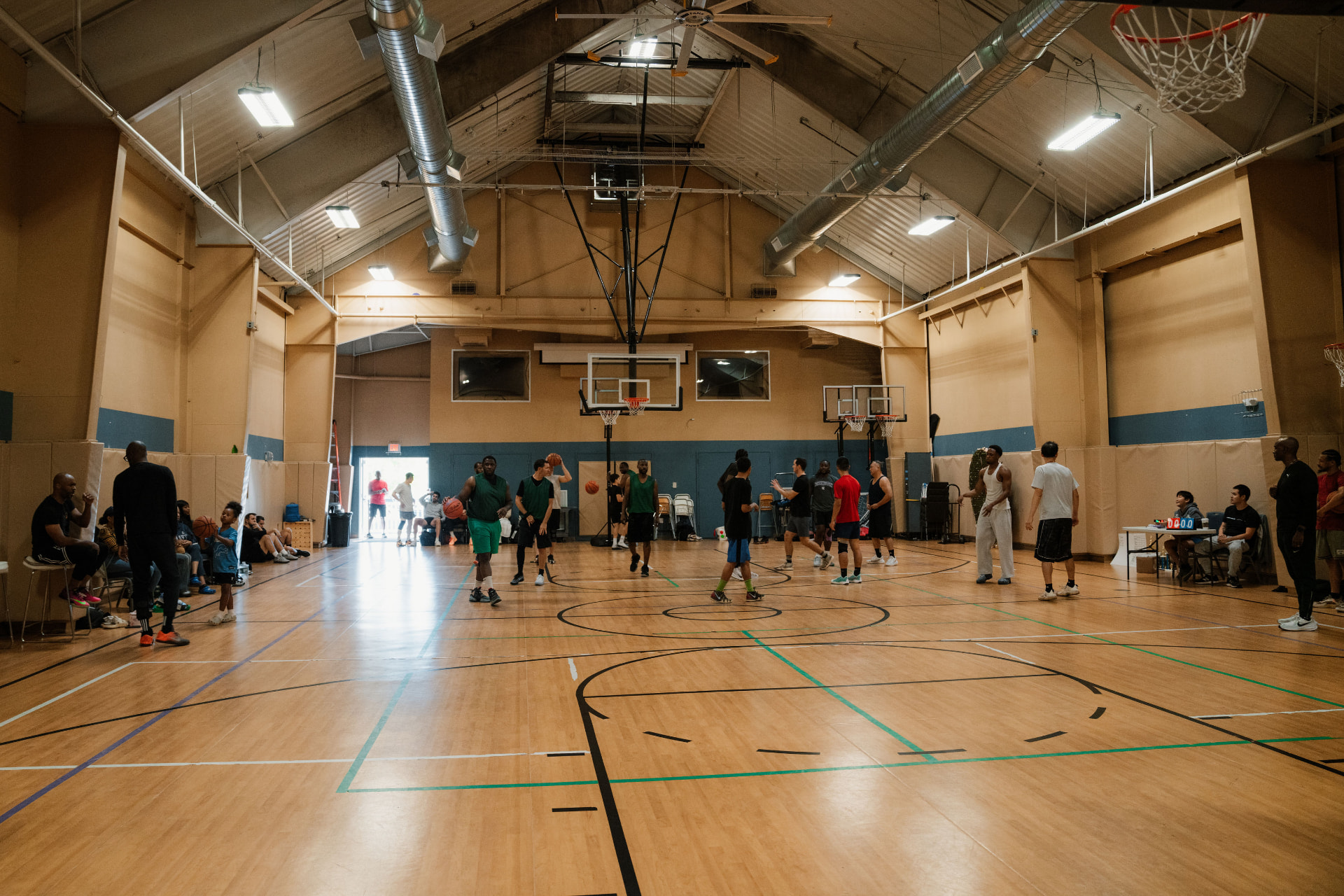 Players warming up for the 3-on-3 basketball tournament