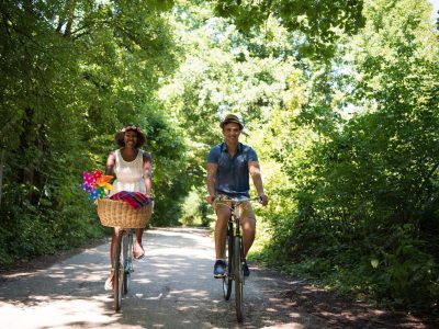 young-man-beautiful-african-american-girl-enjoying-bike-ride-nature-sunny-summer-day_530697-55029.jpg